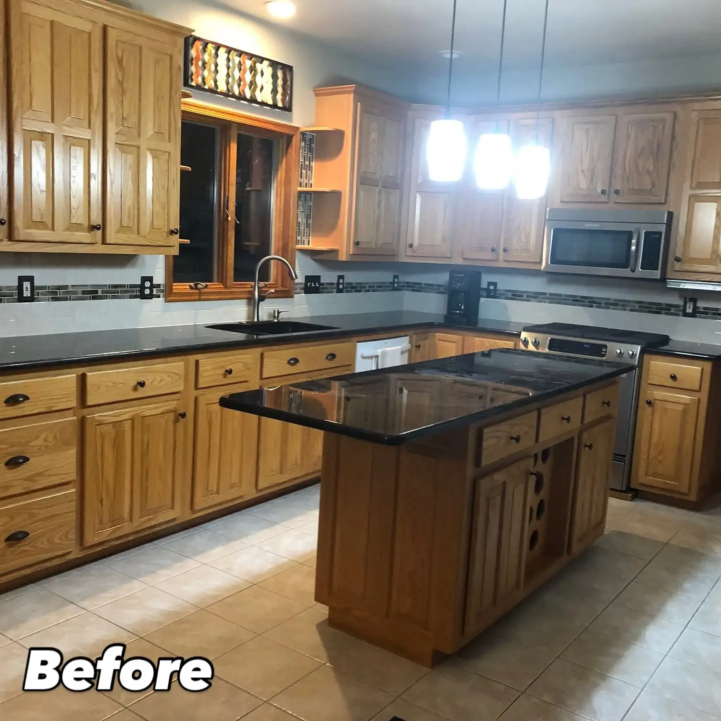 Outdated dark wood kitchen layout